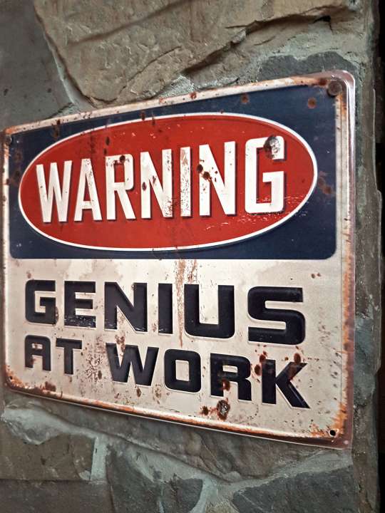 warning genius at work